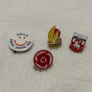 Assorted Collectible Pins buttons Canada bundle of 4